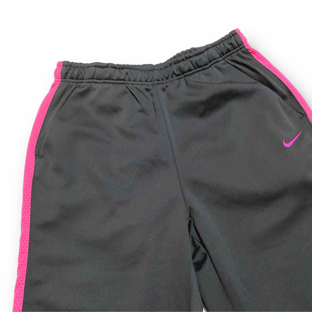 NIKE(ナイキ)のNIKE ナイキ DRI-FIT グレー/ピンク サイドライン トラックパンツ レディースのパンツ(その他)の商品写真