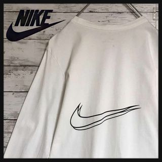 ナイキ(NIKE)の【希少デザイン】ナイキ　背面重ねデカロゴロンＴ　美品　ホワイト　F664(Tシャツ/カットソー(七分/長袖))