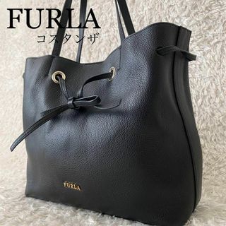 サイトです 美品  フルラ パンチング 巾着 レザー ハンドバッグ