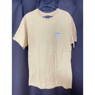 ステューシー(STUSSY)の【美品•希少デザイン】ステューシー　ビッグロゴ入りTシャツ ベージュ 入手困難(シャツ)