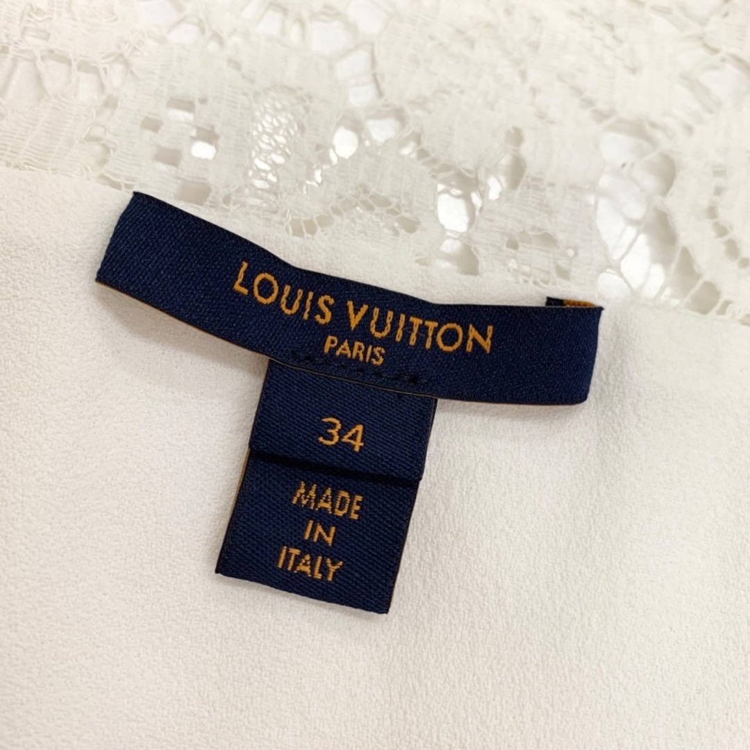 LOUIS VUITTON(ルイヴィトン)のルイヴィトン トップス シャツ ブラウス ホワイト 白 ゴールド レース フラワー 長袖 レディースのトップス(シャツ/ブラウス(長袖/七分))の商品写真