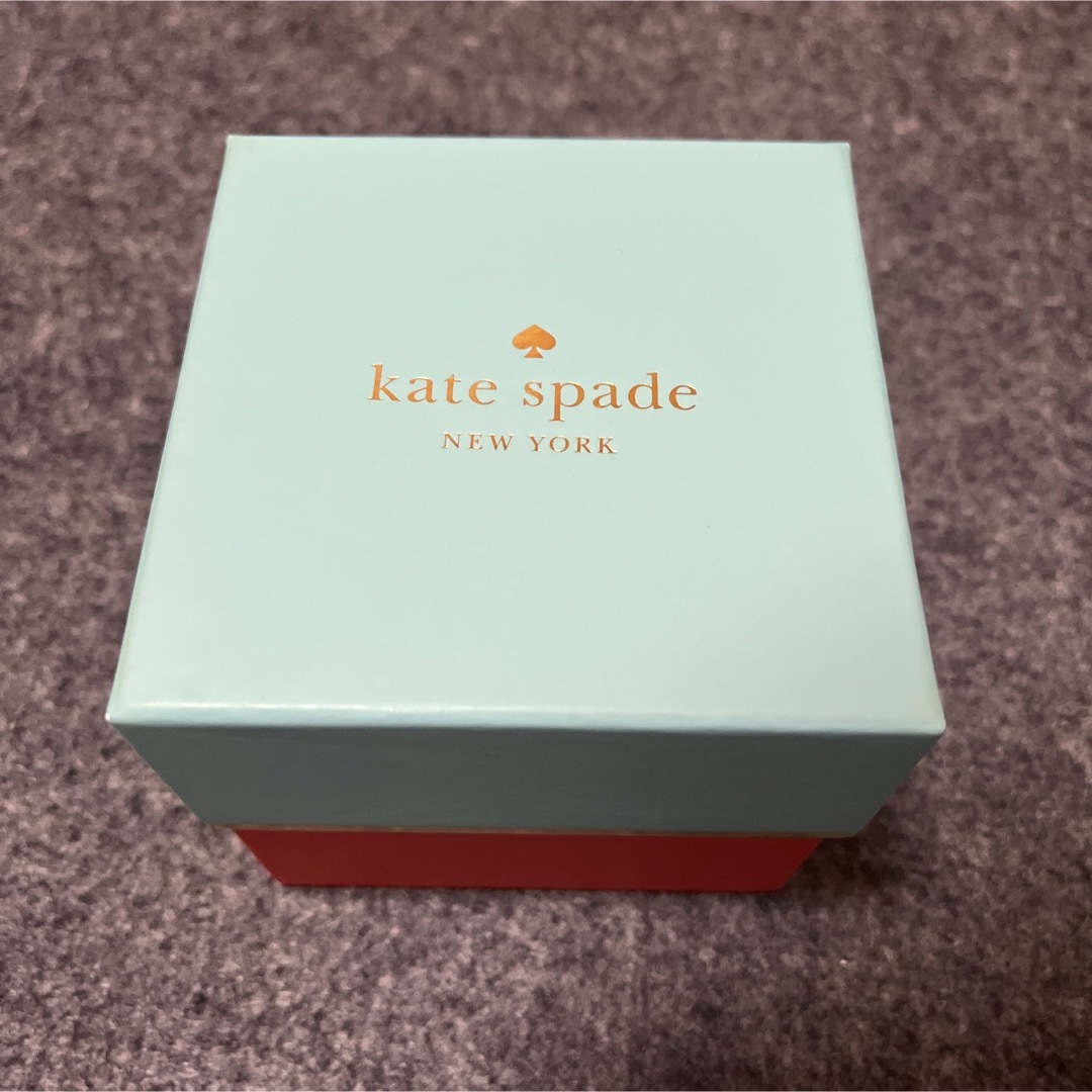 kate spade new york(ケイトスペードニューヨーク)のkate spadeの腕時計　 バングル型　オレンジ レディースのファッション小物(腕時計)の商品写真