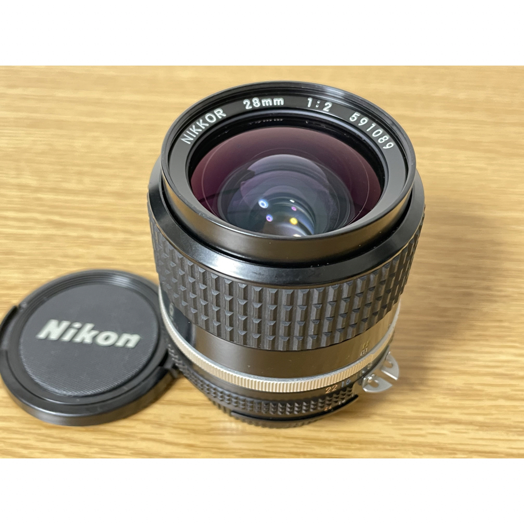 Nikon(ニコン)のNikon Ai-S NIKKOR 28mm F2と説明書 スマホ/家電/カメラのカメラ(レンズ(単焦点))の商品写真