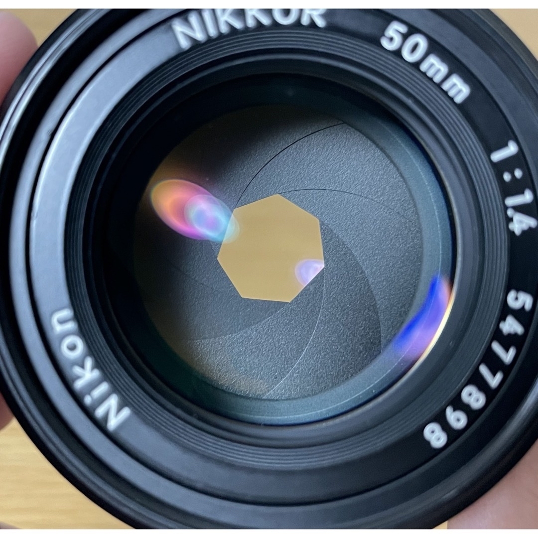 Nikon(ニコン)のNikon Ai-S NIKKOR 50mm F1.4と説明書 スマホ/家電/カメラのカメラ(レンズ(単焦点))の商品写真