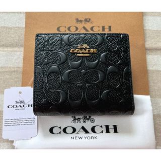 大人気！！COACHコーチ折りたたみ財布 レディースのブラック色 ...