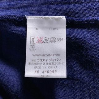 LACOSTE - LACOSTE メリノウール タートルネック ニット ネイビー 文字