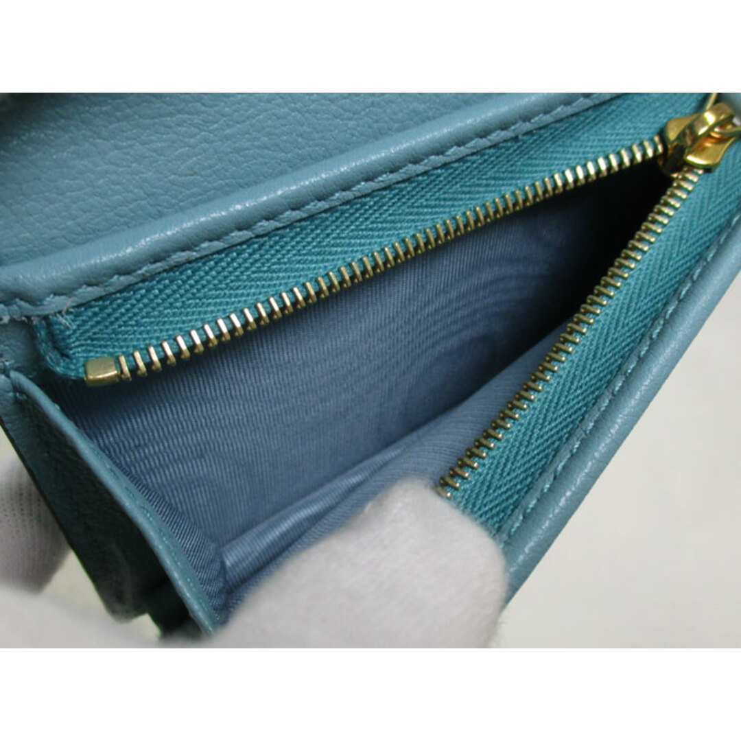 GUCCI - GUCCI 二つ折り コンパクト財布 GGエンボスレザー GUCCI - GUCCI 二つ折り コンパクト財布 GGエンボスレザー