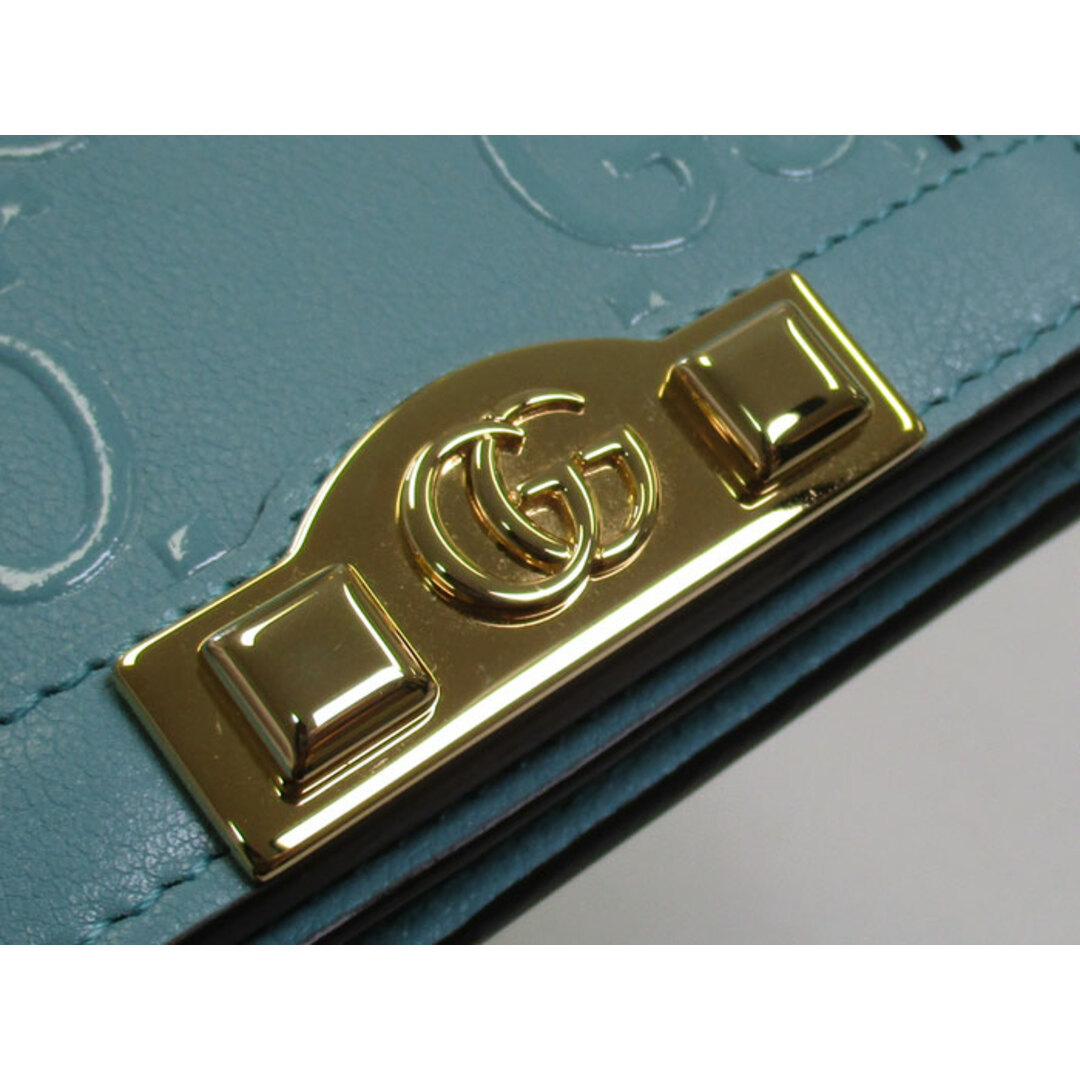 GUCCI - GUCCI 二つ折り コンパクト財布 GGエンボスレザー GUCCI - GUCCI 二つ折り コンパクト財布 GGエンボスレザー