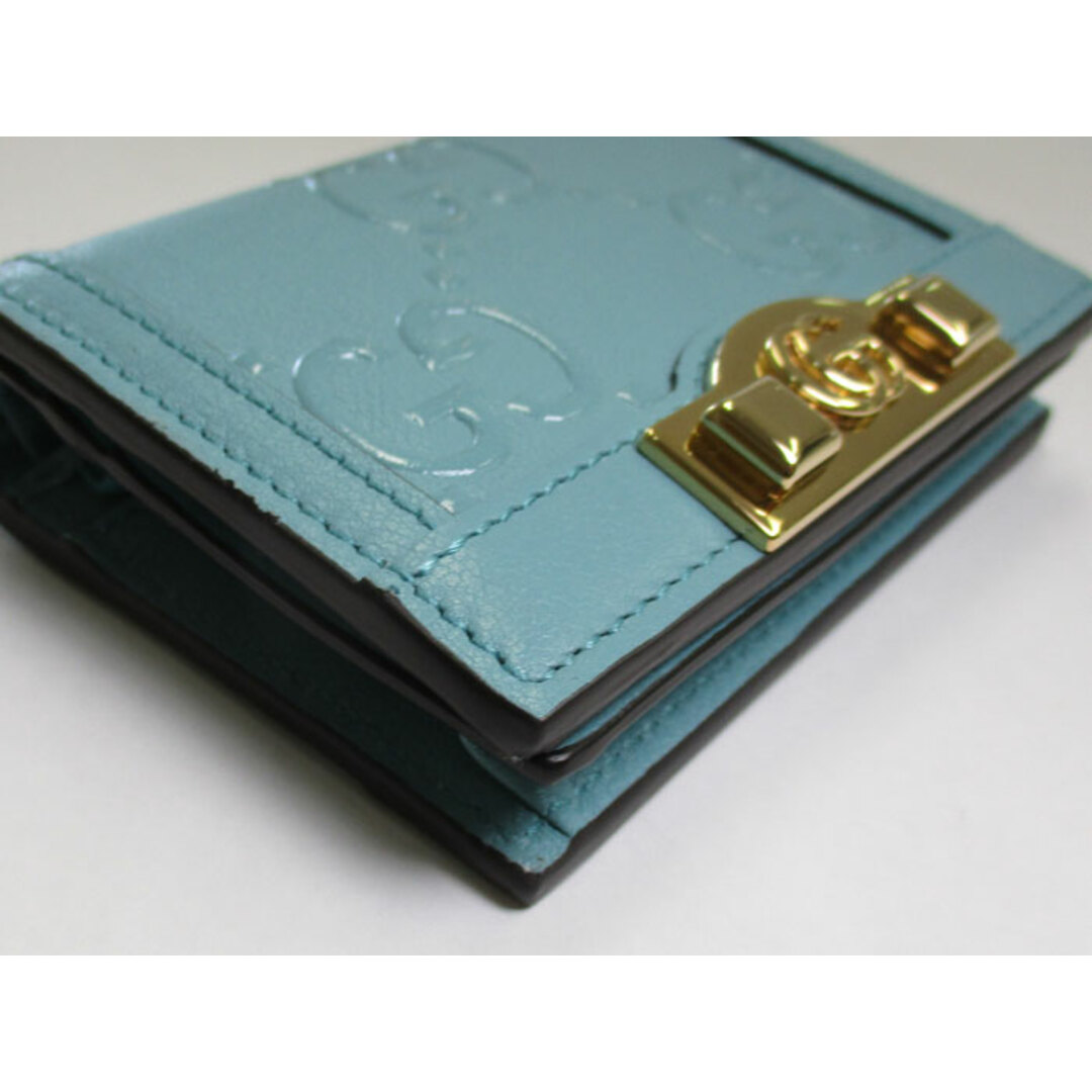 GUCCI - GUCCI 二つ折り コンパクト財布 GGエンボスレザー GUCCI - GUCCI 二つ折り コンパクト財布 GGエンボスレザー