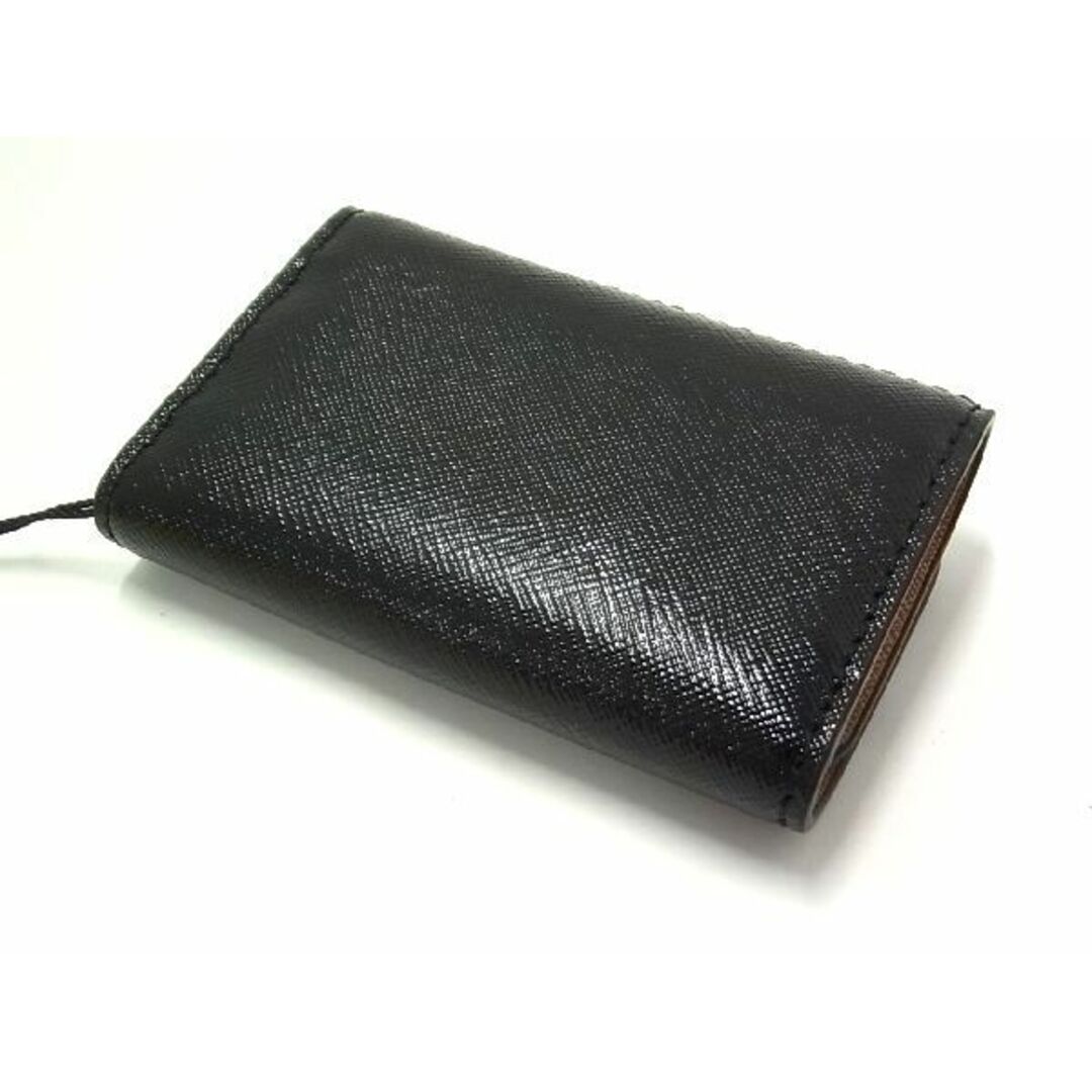 ■新品■未使用■ MARC JACOBS マークジェイコブス 6連 キーケース 鍵入れ メンズ レディース ブラック系×ホワイト系 AN2739