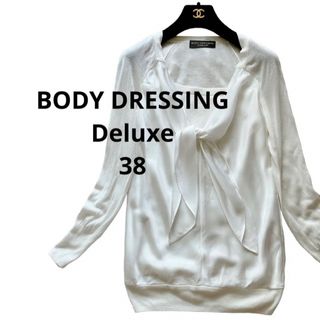 ボディドレッシングデラックス(BODY DRESSING Deluxe)のボディドレッシングデラックス白ホワイト前リボン重ね着風長袖トップス38(ニット/セーター)