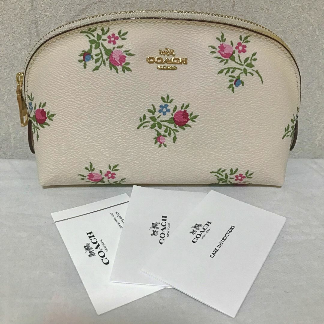 COACH(コーチ)のCOACH コーチ 花柄レザーポーチ ホワイト レディースのファッション小物(ポーチ)の商品写真