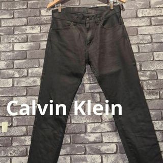 カルバンクライン(Calvin Klein)の古着カルバンクライン　ジーンズ スキニーブラック　デニムパンツ 革パッチ(デニム/ジーンズ)