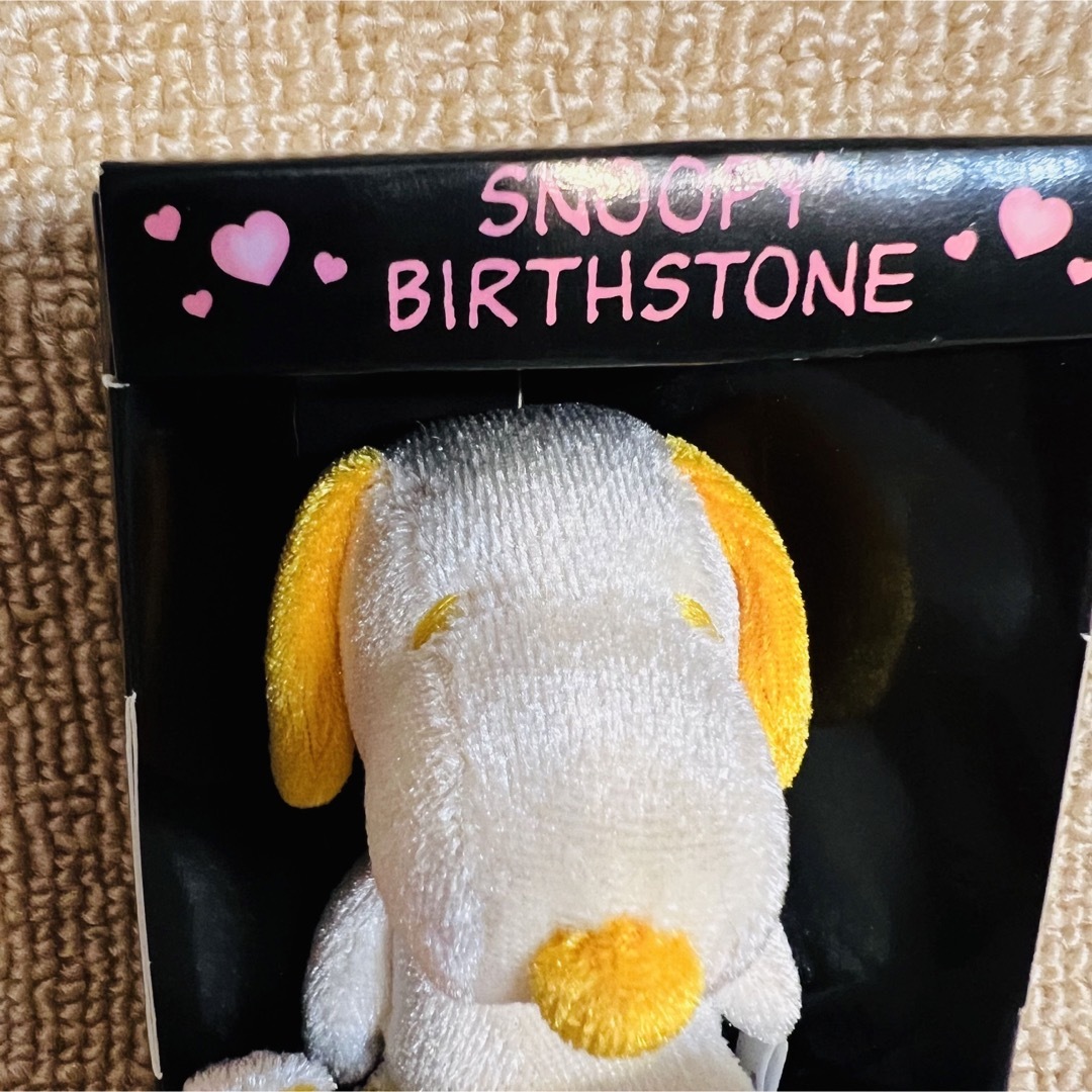 SNOOPY(スヌーピー)の【新品】SNOOPY BIRTHSTONE.11 Nov トパーズ エンタメ/ホビーのおもちゃ/ぬいぐるみ(キャラクターグッズ)の商品写真