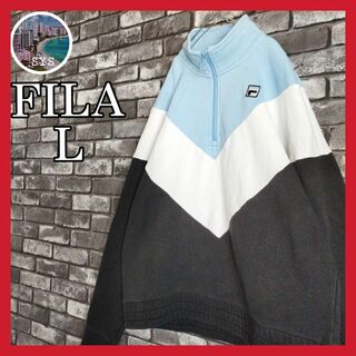 フィラ(FILA)のFILAフィラ刺繍ワンポイントロゴハーフジッププルオーバースウェットトレーナー青(スウェット)
