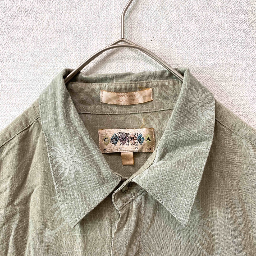 US古着　アロハシャツ　ハワイアン　半袖　総柄　ヤシの木　男女兼用　XLサイズ メンズのトップス(シャツ)の商品写真