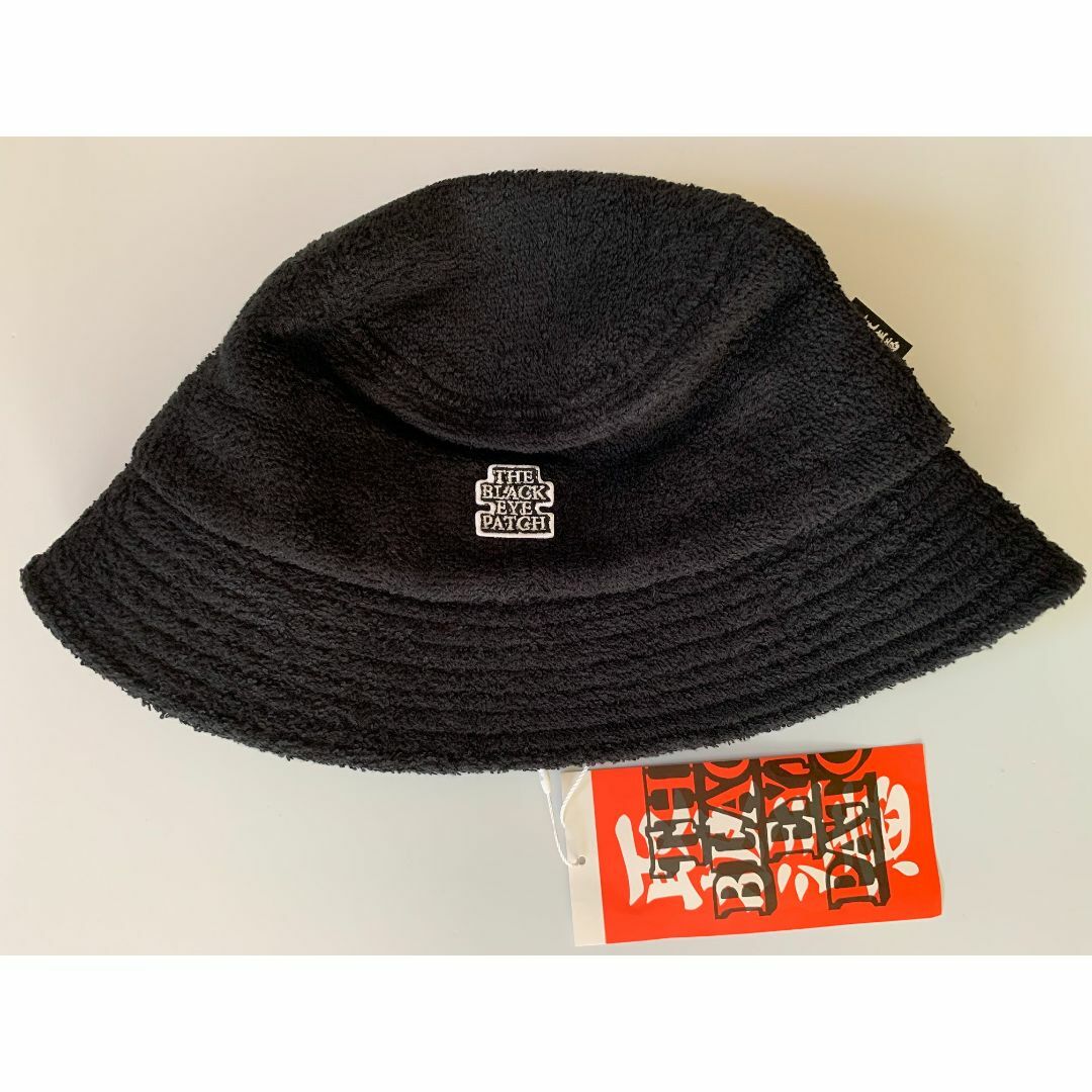 BLACK EYE PATCH OG LABEL PILE BUCKET HAT | hartwellspremium.com