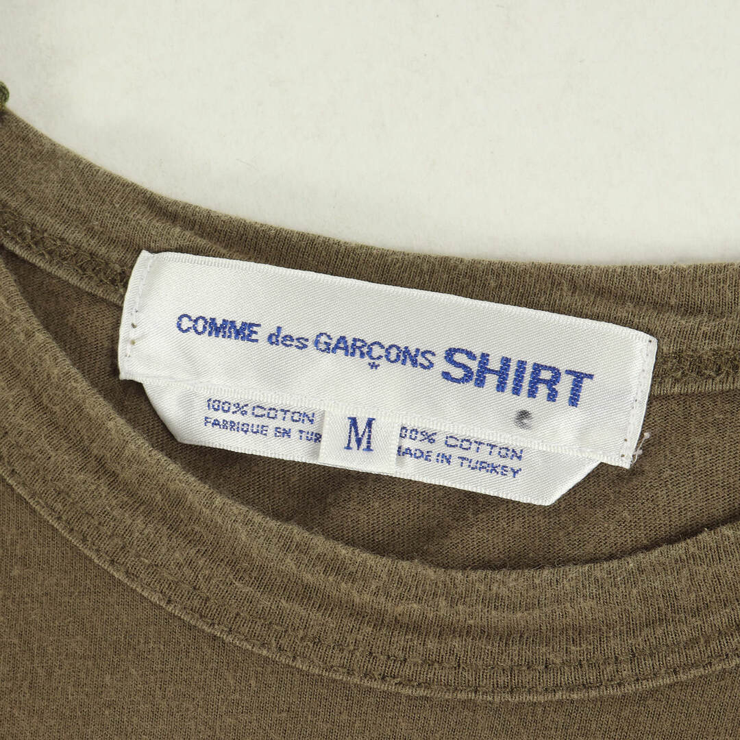 COMME des GARCONS(コムデギャルソン)のCOMME des GARCONS コムデギャルソン Tシャツ サイズ:M 90s バックネック ロゴ クルーネック Tシャツ 半袖 無地 SHIRT シャツ アーカイブ カーキ トップス カットソー シンプル ブランド【メンズ】【中古】 メンズのトップス(Tシャツ/カットソー(半袖/袖なし))の商品写真