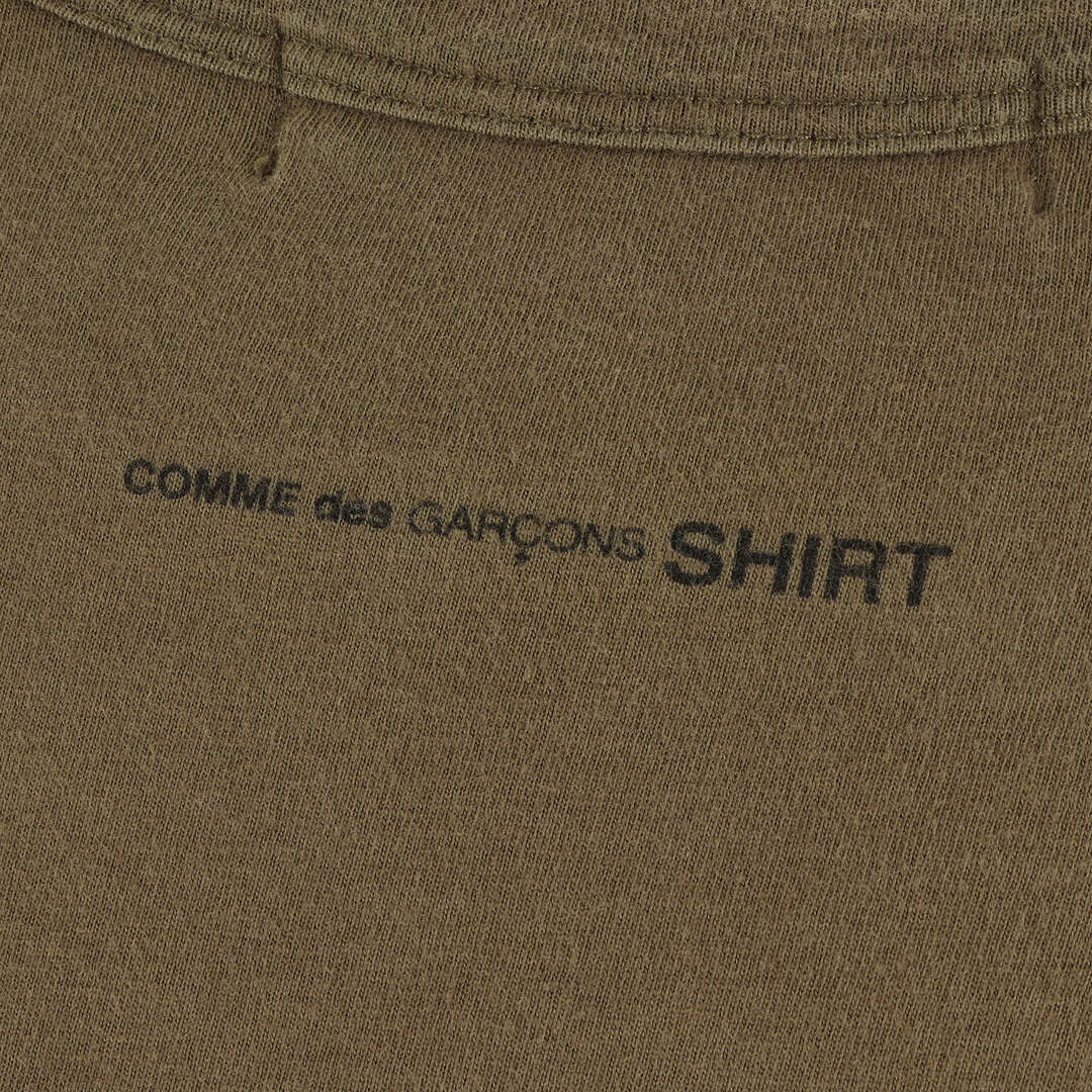 COMME des GARCONS(コムデギャルソン)のCOMME des GARCONS コムデギャルソン Tシャツ サイズ:M 90s バックネック ロゴ クルーネック Tシャツ 半袖 無地 SHIRT シャツ アーカイブ カーキ トップス カットソー シンプル ブランド【メンズ】【中古】 メンズのトップス(Tシャツ/カットソー(半袖/袖なし))の商品写真