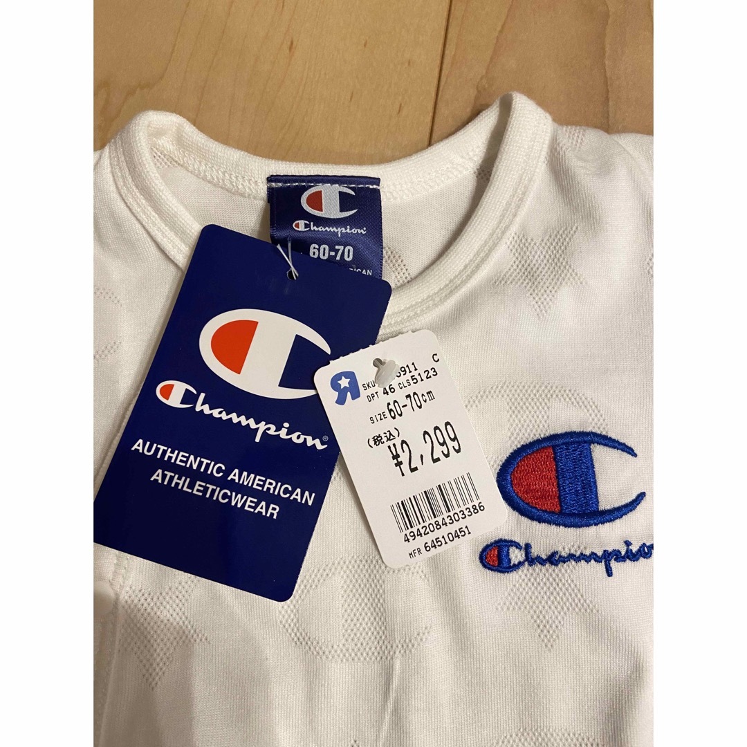 Champion(チャンピオン)の【ほぼ半額！新品タグ付き】チャンピオン　半袖ロンパース　60〜70cm 赤ちゃん キッズ/ベビー/マタニティのベビー服(~85cm)(ロンパース)の商品写真