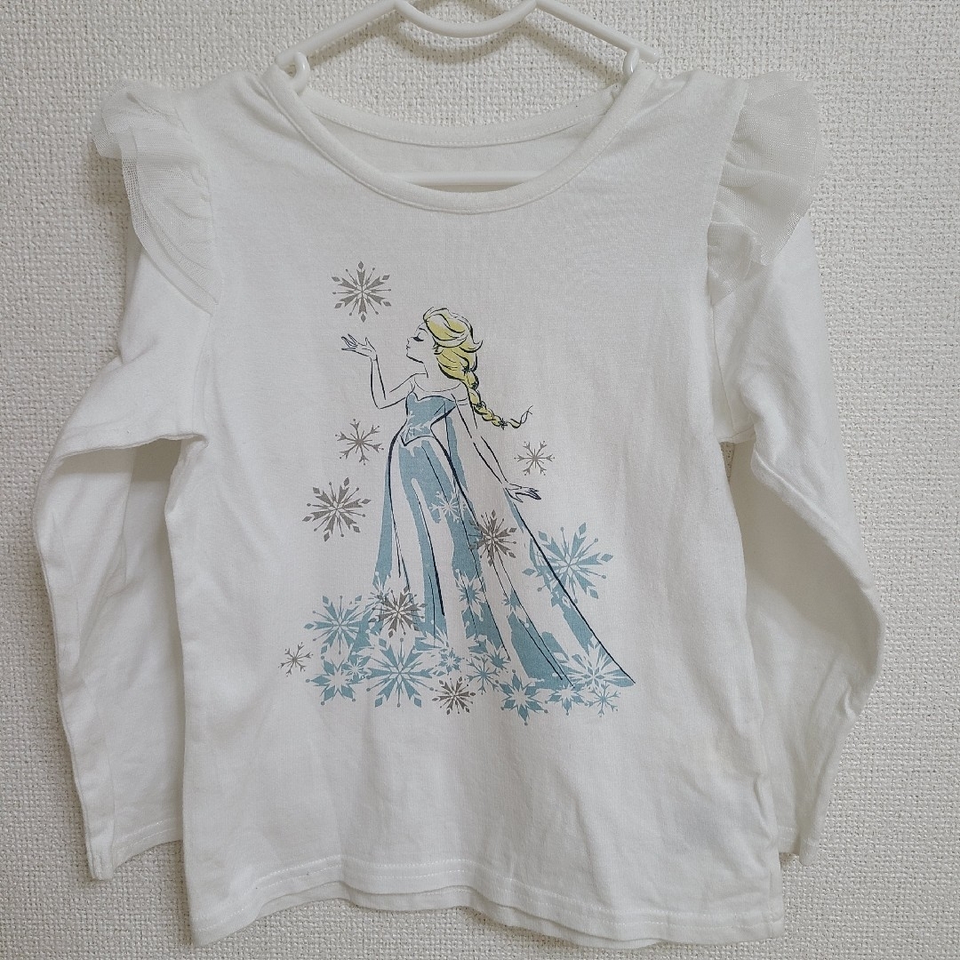 アナと雪の女王(アナトユキノジョオウ)のエルサ 110 肩フリル 長袖Tシャツ キッズ/ベビー/マタニティのキッズ服女の子用(90cm~)(Tシャツ/カットソー)の商品写真