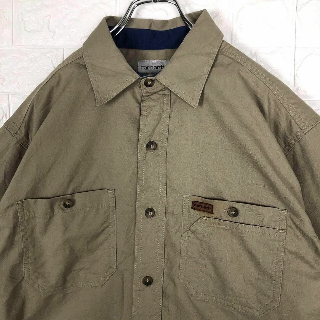 carhartt(カーハート)のカーハート レザーワンポイント 半袖シャツ ロゴワッペン カジュアルアースカラー メンズのトップス(シャツ)の商品写真