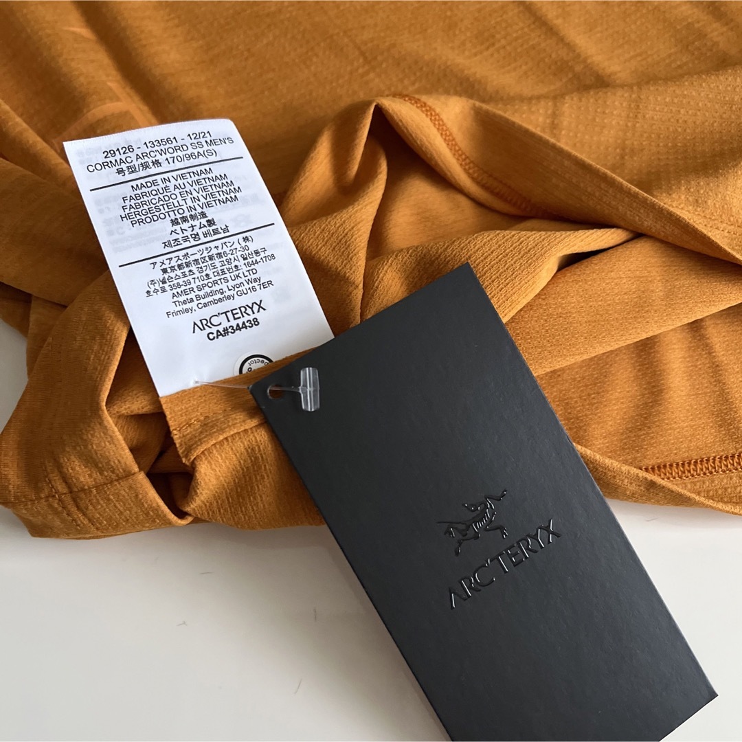 ARC'TERYX(アークテリクス)のARC'TERYX アークテリクス　Cormac Arc'Word SS Sオレ メンズのトップス(Tシャツ/カットソー(半袖/袖なし))の商品写真