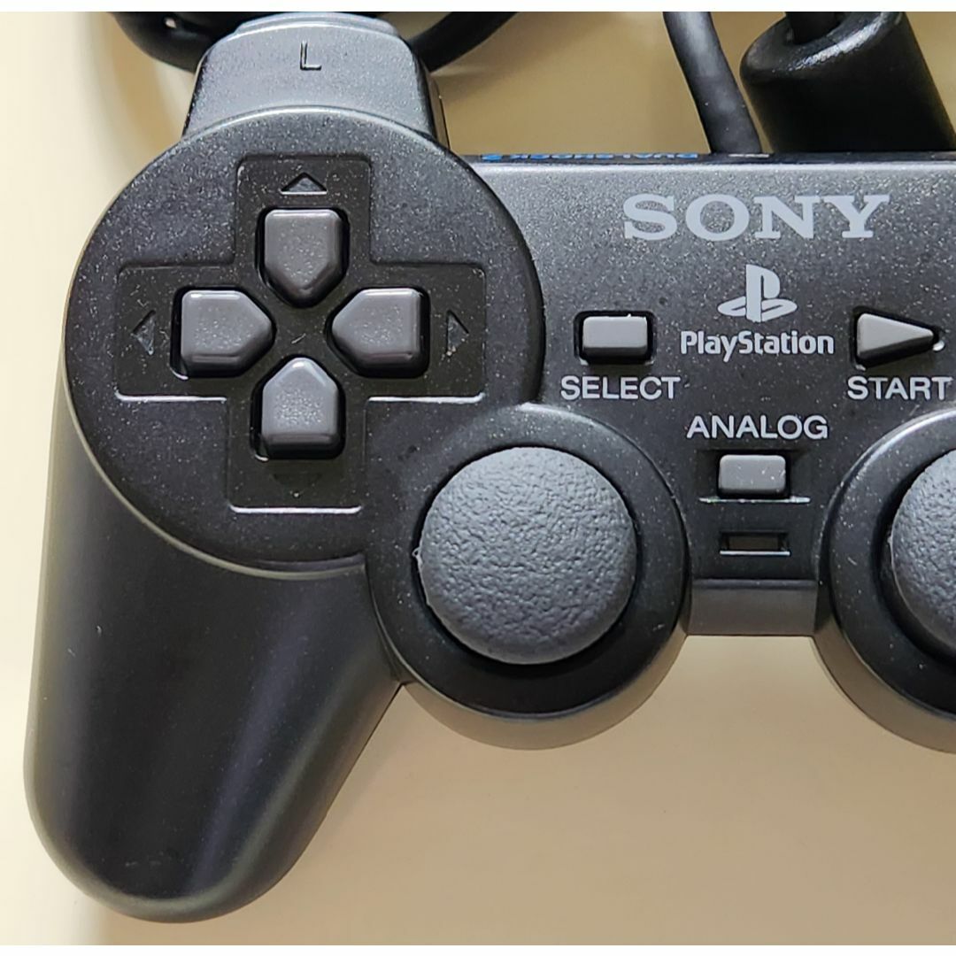 PlayStation2(プレイステーション2)のPS2コントローラー 純正品 ブラック　２個セット エンタメ/ホビーのゲームソフト/ゲーム機本体(家庭用ゲーム機本体)の商品写真