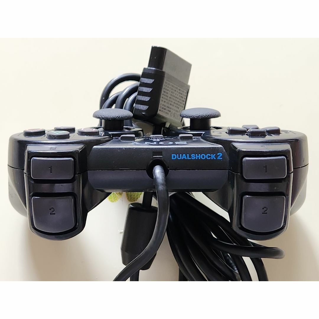 PlayStation2(プレイステーション2)のPS2コントローラー 純正品 ブラック　２個セット エンタメ/ホビーのゲームソフト/ゲーム機本体(家庭用ゲーム機本体)の商品写真