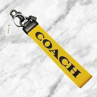 コーチ(COACH)の【新品】COACH コーチ キーリング ロゴ ストラップタイプ イエロー(キーホルダー)