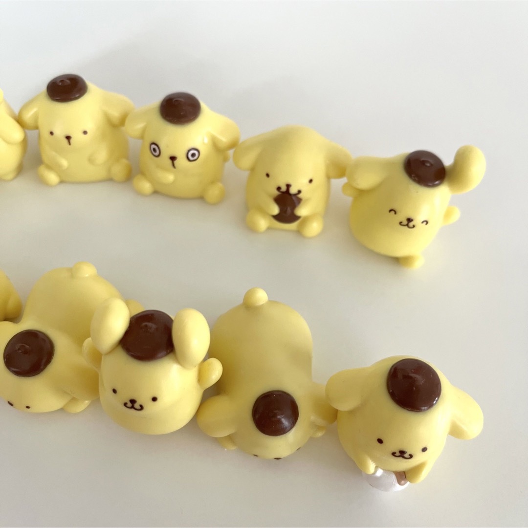 ポムポムプリン(ポムポムプリン)の未使用あり✨ポムポムプリン🍮フィギア11個💛おまけ付 エンタメ/ホビーのフィギュア(その他)の商品写真