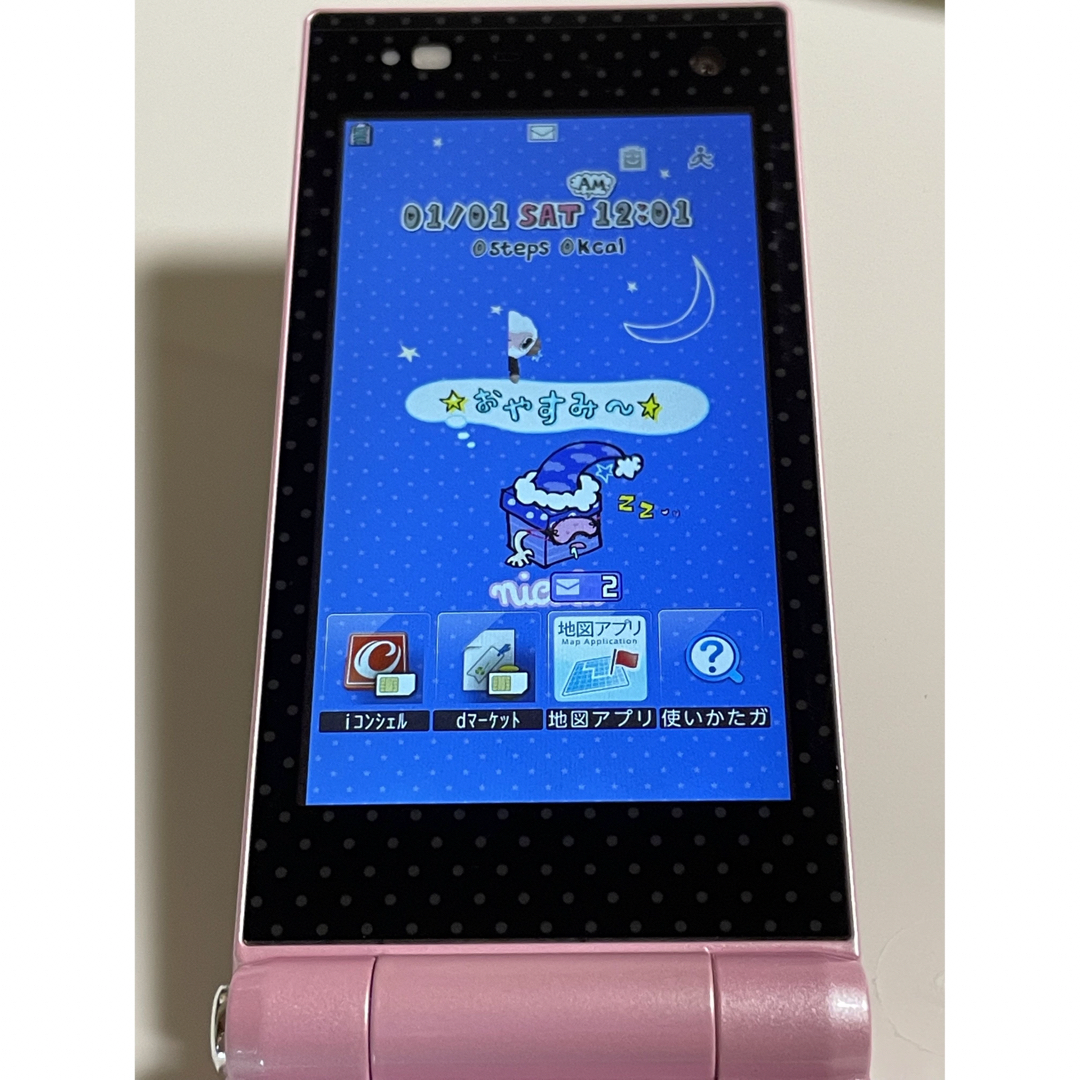 美品 docomo F-06D Girls' ハッピーピンク ニコラコラボ⭐️ - 携帯