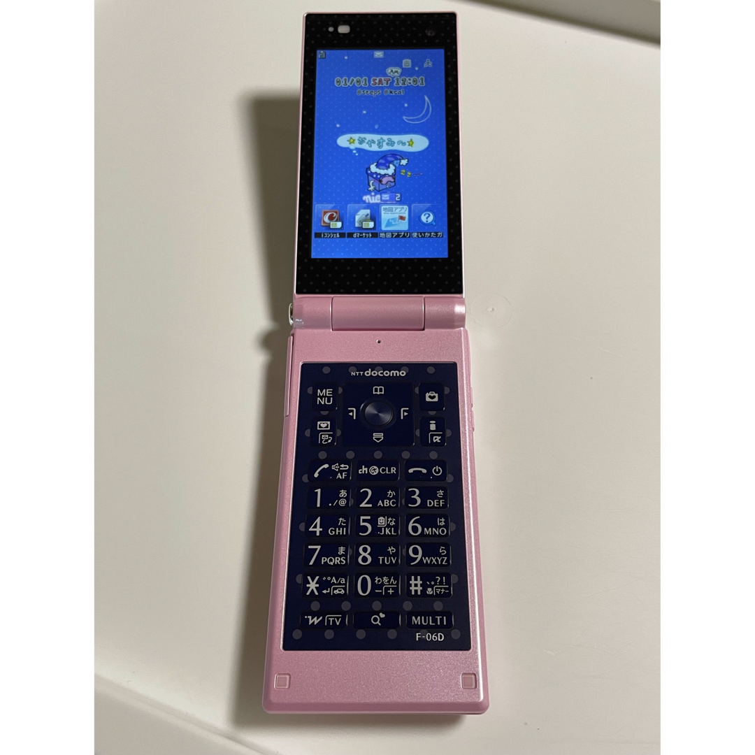 美品 docomo F-06D Girls' ハッピーピンク ニコラコラボ⭐️ - 携帯