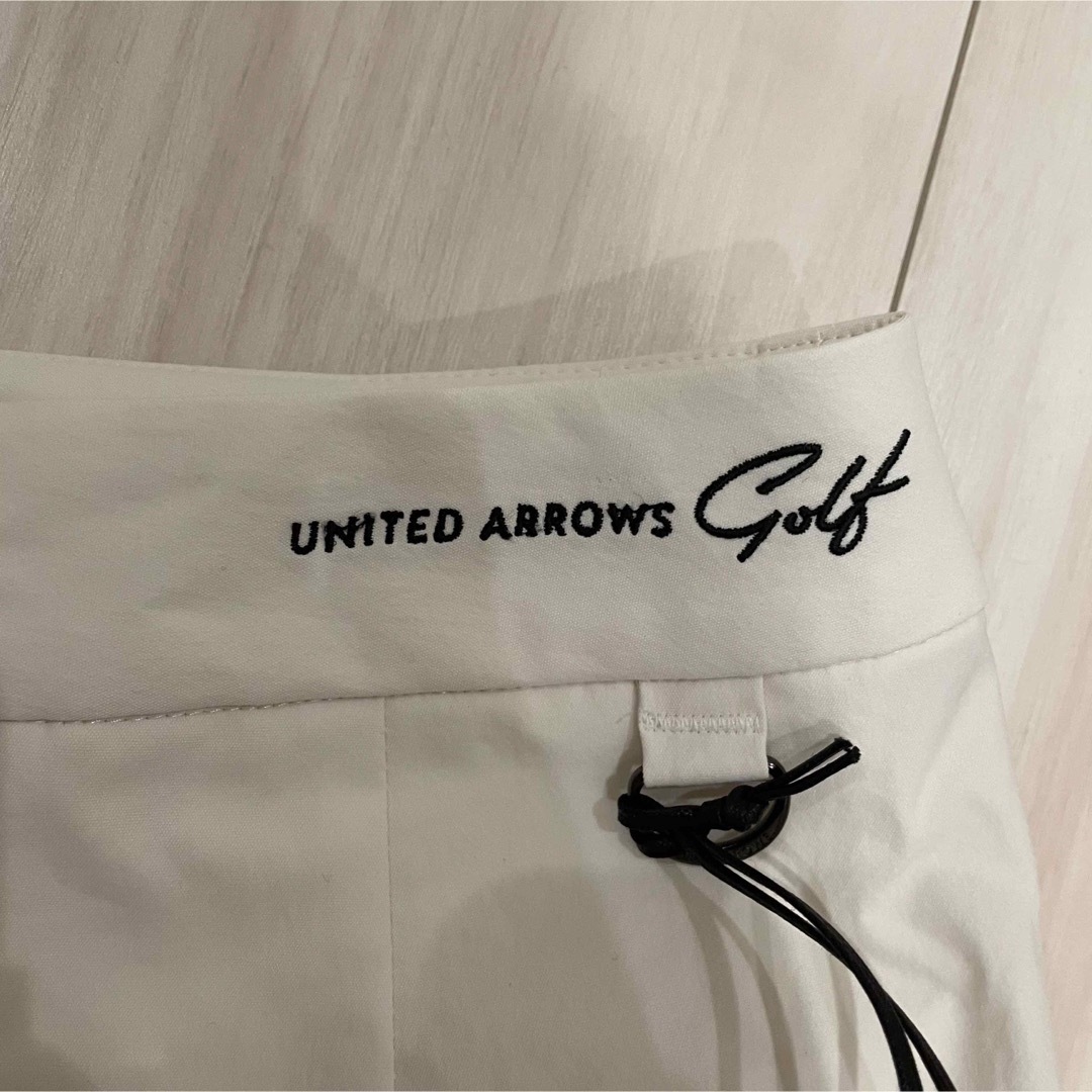 UNITED ARROWS(ユナイテッドアローズ)の UNITED ARROWS GOLF アシンメトリー プリーツスカート スポーツ/アウトドアのゴルフ(ウエア)の商品写真