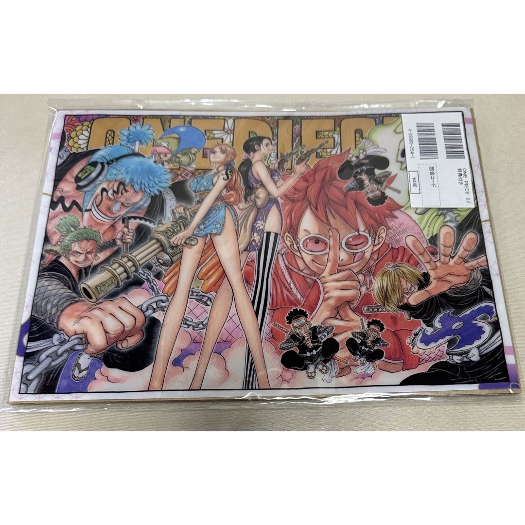 ONE PIECE(ワンピース)の非売品　ワンピース　92巻　セブンイレブン購入特典　ブックカバー エンタメ/ホビーの漫画(少年漫画)の商品写真