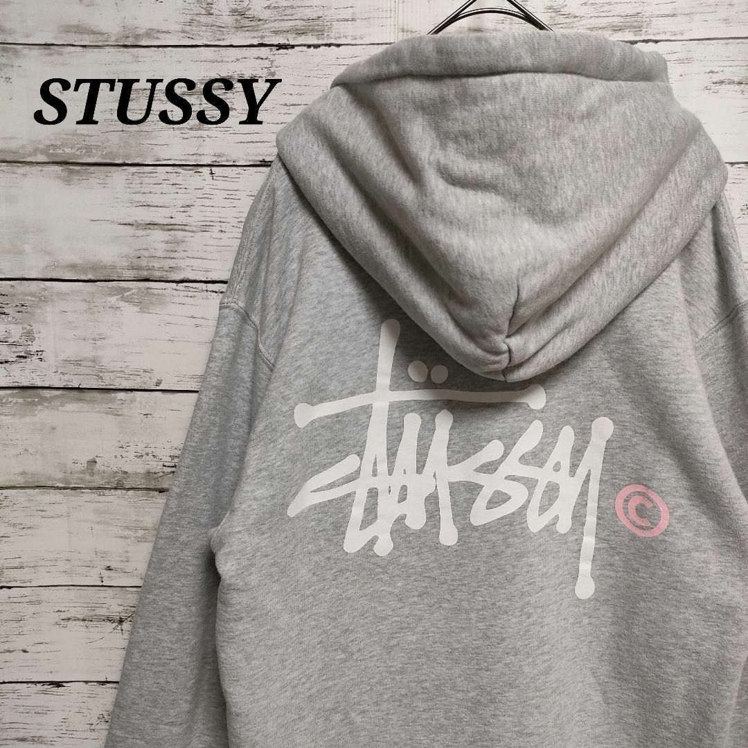 トップスstussy　ステューシー　パーカー　ビッグプリント　デカロゴ