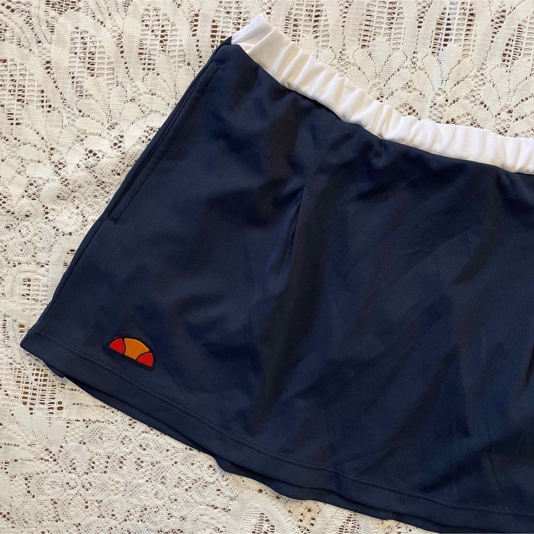 ellesse(エレッセ)のエレッセ　テニスウェアゲームスコート　紺　M スポーツ/アウトドアのテニス(ウェア)の商品写真