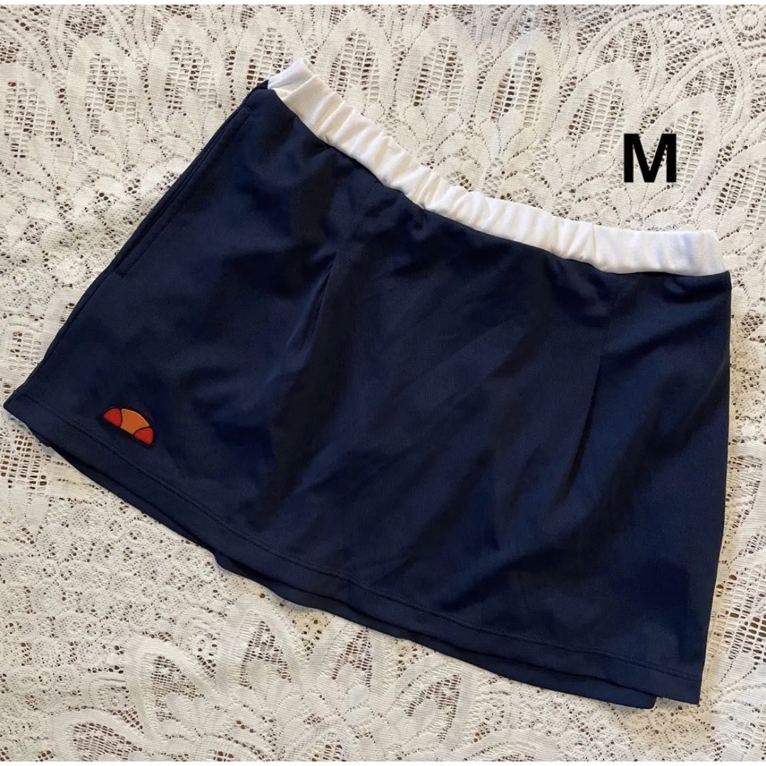 ellesse(エレッセ)のエレッセ　テニスウェアゲームスコート　紺　M スポーツ/アウトドアのテニス(ウェア)の商品写真