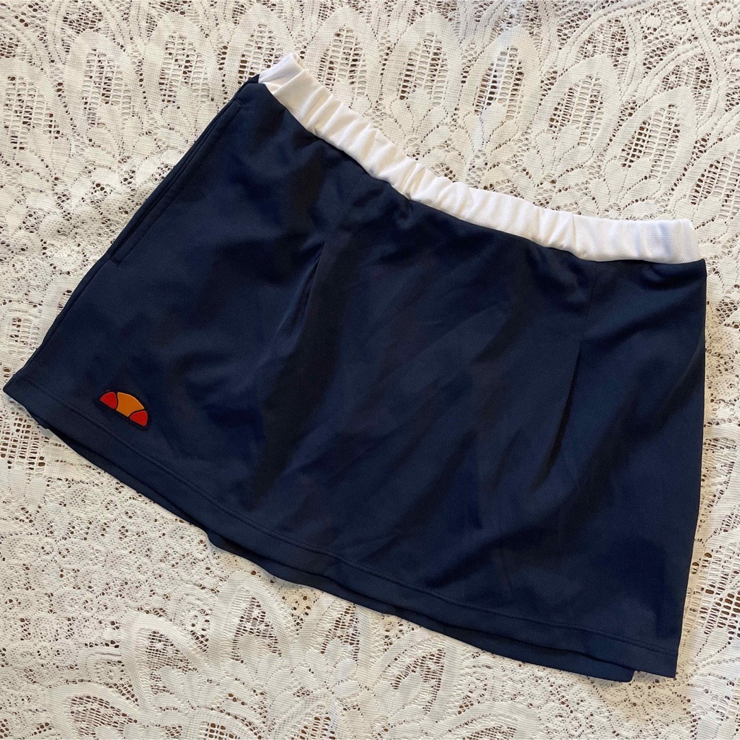 ellesse(エレッセ)のエレッセ　テニスウェアゲームスコート　紺　M スポーツ/アウトドアのテニス(ウェア)の商品写真