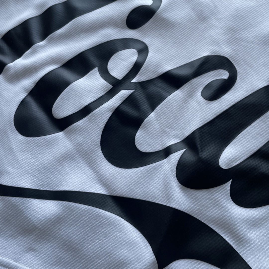 F.C.R.B.(エフシーアールビー)のBristol コカコーラ　コラボポロシャツ　XL メンズのトップス(Tシャツ/カットソー(半袖/袖なし))の商品写真