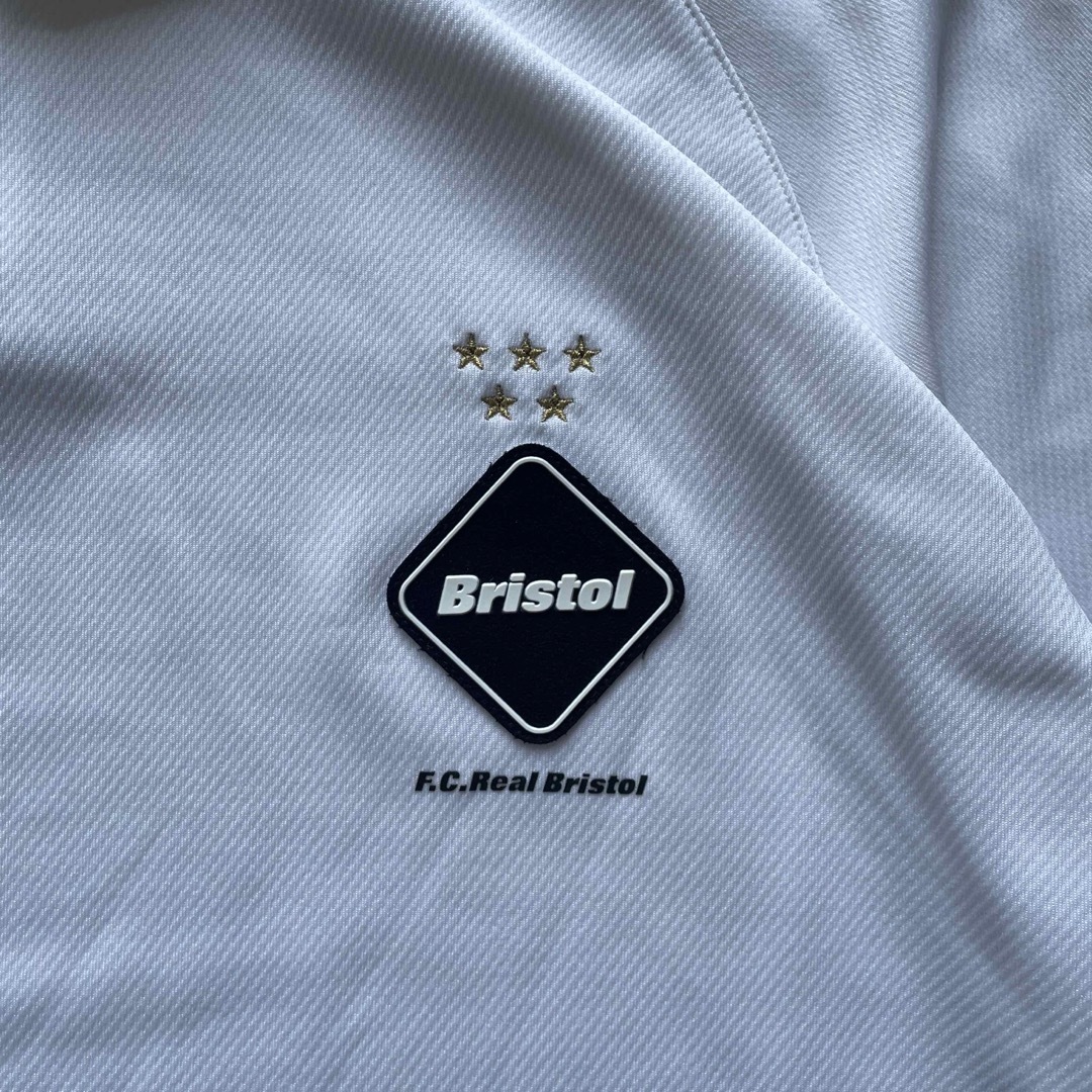 F.C.R.B.(エフシーアールビー)のBristol コカコーラ　コラボポロシャツ　XL メンズのトップス(Tシャツ/カットソー(半袖/袖なし))の商品写真