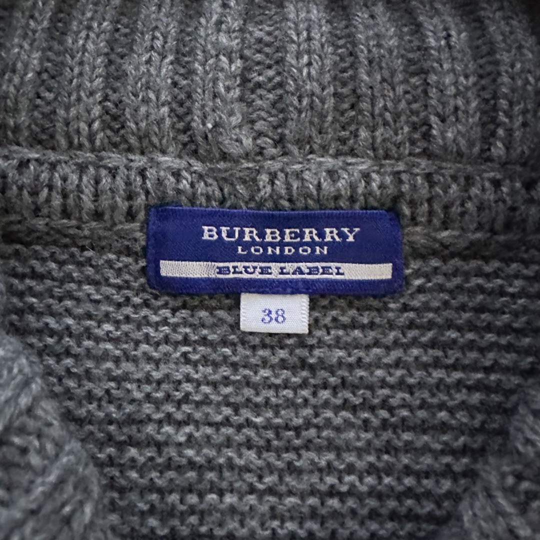 BURBERRY BLUE LABEL(バーバリーブルーレーベル)の美品ꕤ バーバリーブルーレーベル ポンチョ ケーブル編み グレー ウール 38 レディースのジャケット/アウター(ポンチョ)の商品写真