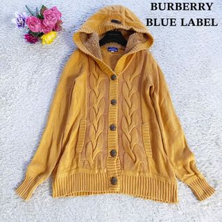 バーバリーブルーレーベル(BURBERRY BLUE LABEL)のꕤバーバリーブルーレーベル ケーブル編み ニット パーカー ボア マスタード色(ニット/セーター)