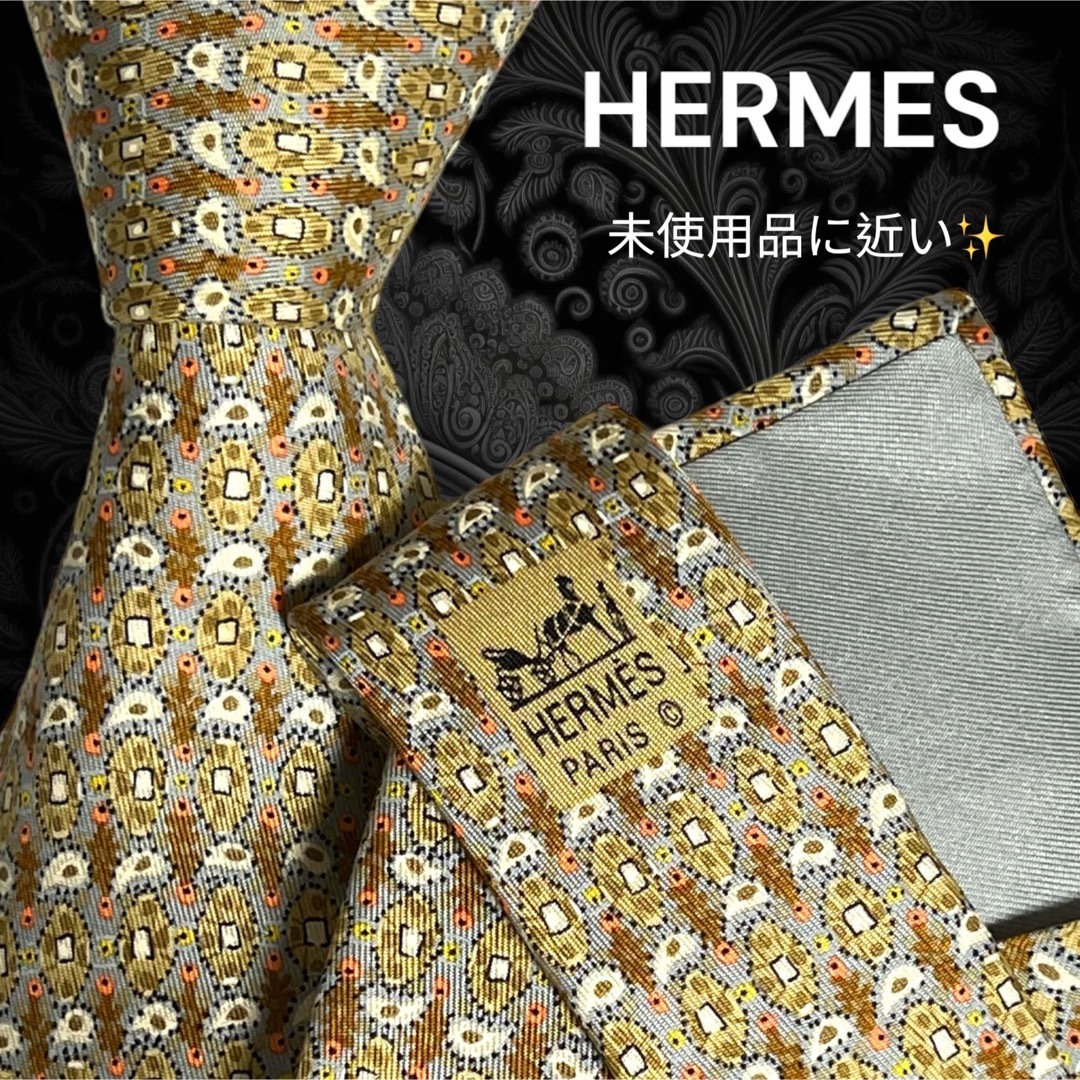 Hermes(エルメス)の✨極美品✨ HERMES エルメス フランス製 ベージュ系 総柄 マルチカラー メンズのファッション小物(ネクタイ)の商品写真