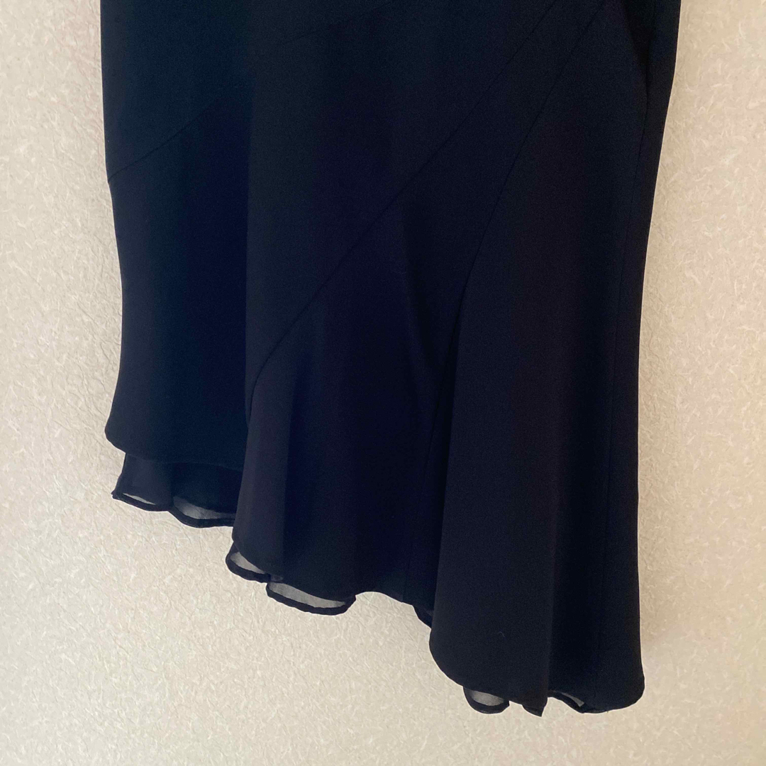 INTERPLANET(インタープラネット)のインタープラネット ボトムス スカート アシンメトリー 黒  38サイズ 日本製 レディースのスカート(ひざ丈スカート)の商品写真