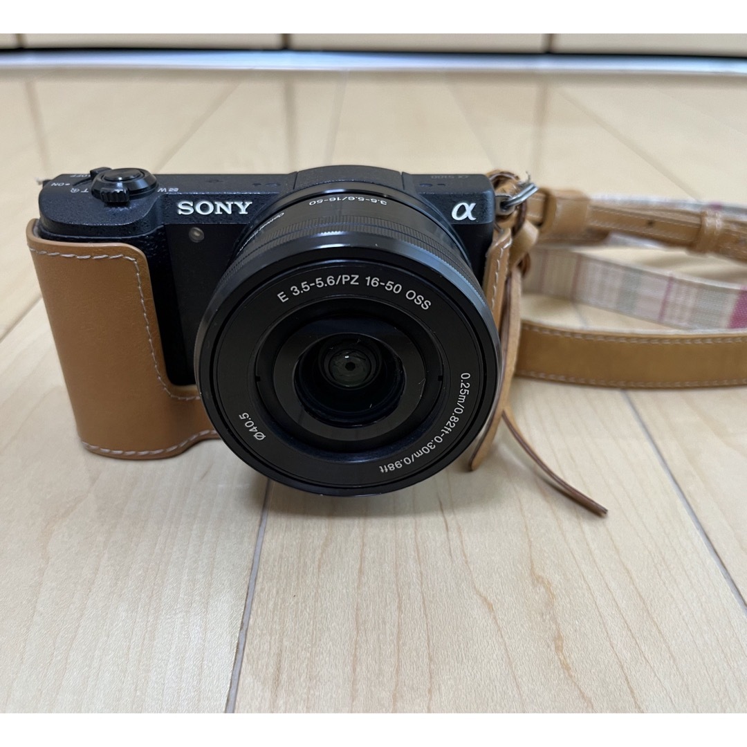 SONY(ソニー)のSONY α5100 ILCE-5100Lブラック（純正ボディケース付） スマホ/家電/カメラのカメラ(ミラーレス一眼)の商品写真