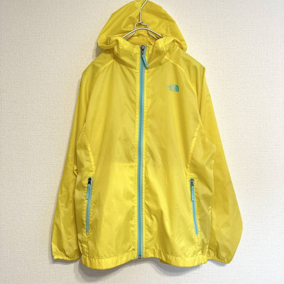 THE NORTH FACE(ザノースフェイス)のノースフェイス　ナイロンジャケット　イエロー　140 boy/girl　 キッズ/ベビー/マタニティのキッズ服男の子用(90cm~)(ジャケット/上着)の商品写真