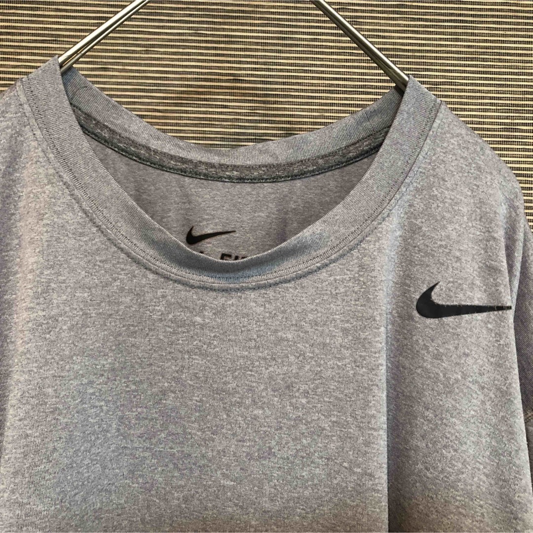 NIKE(ナイキ)の【ナイキ】ロンT　スウォッシュロゴ　ワンポイントロゴ　グレー　メキシコ製74 メンズのトップス(Tシャツ/カットソー(七分/長袖))の商品写真