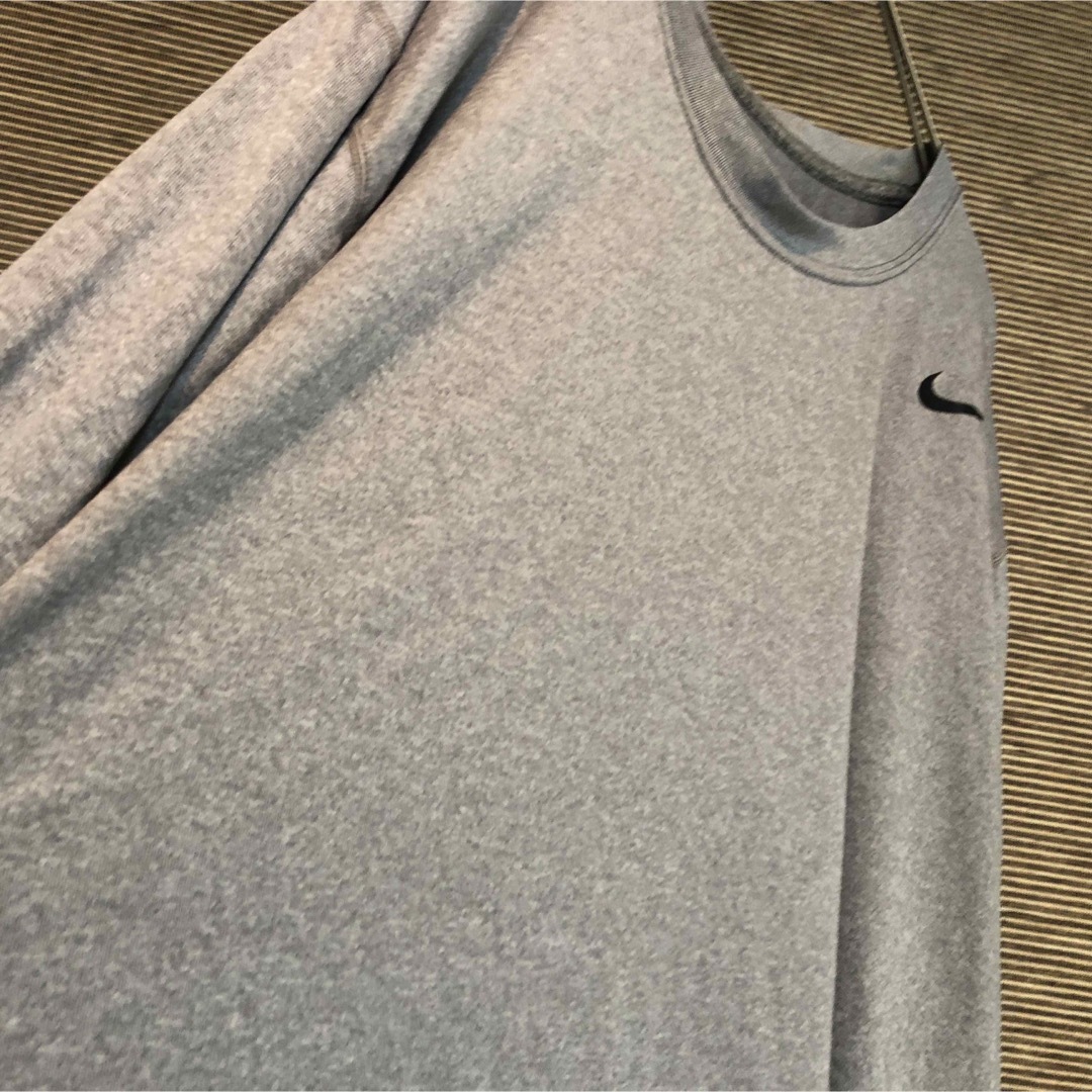 NIKE(ナイキ)の【ナイキ】ロンT　スウォッシュロゴ　ワンポイントロゴ　グレー　メキシコ製74 メンズのトップス(Tシャツ/カットソー(七分/長袖))の商品写真