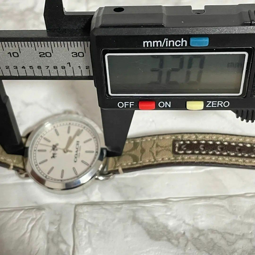 COACH(コーチ)の稼動品　美品　COACH コーチ　ホースキャリッジ　腕時計　シグネチャー レディースのファッション小物(腕時計)の商品写真